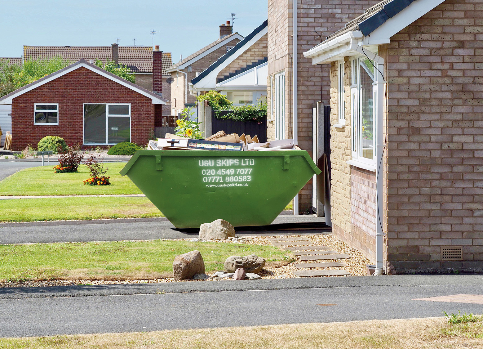 Rubbish skip on a housing estate